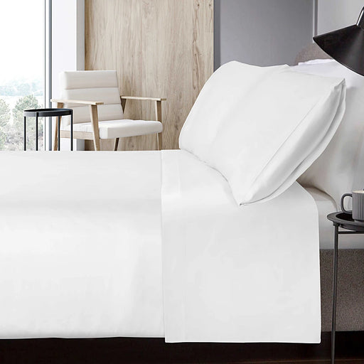 White 600 thread count sateen fitted sheet styled on a bed, showing smooth and elegant hotel-quality finish.