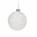 Close-up of white textured Christmas bauble showing detailed pattern and matte textured surface.