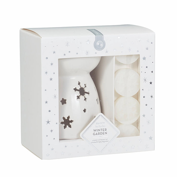 Close-up of Winter Garden Wax Burner Gift Set showing wax burner and floral-scented wax melts.