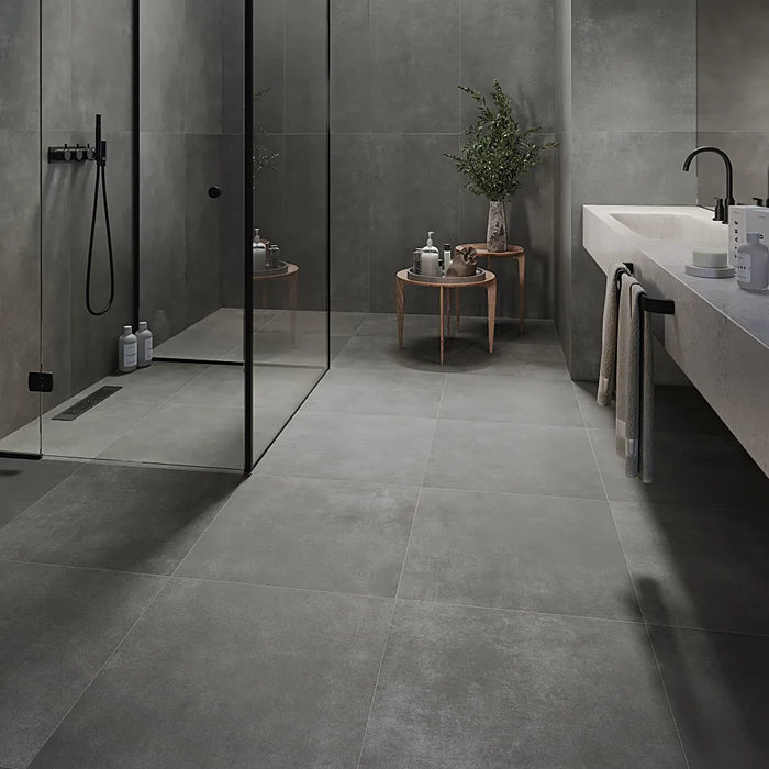 Sleek bathroom with Work B Coal Anti-Slip Porcelain tiles in a deep charcoal tone.