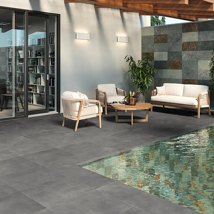 Sleek outdoor area with Work B Coal Anti-Slip Porcelain tiles in a deep charcoal tone.
