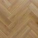 Close-up herringbone pattern detail of Alicante 12mm laminate flooring