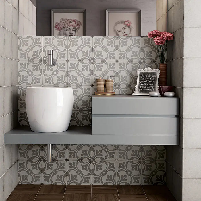 Art Nouveau La Rambla Grey patterned porcelain tiles installed on a bathroom feature wall