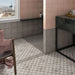 Art Nouveau La Rambla Grey decorative porcelain floor tiles installed in a contemporary bathroom