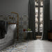 Art Nouveau Music Hall patterned porcelain tiles installed on a bathroom floor and feature wall