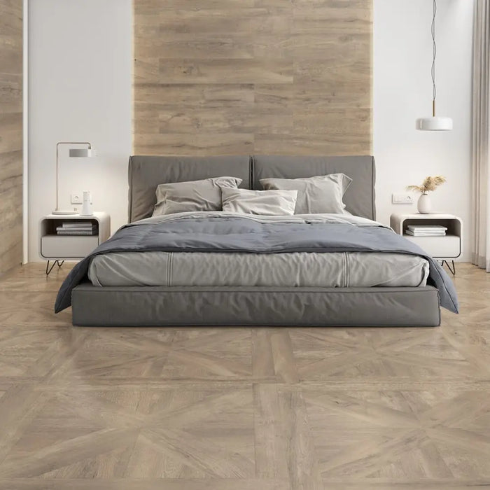 Aspen Nordic Taupe parquet-effect porcelain tile floor in a bedroom setting