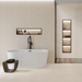 Contemporary bathroom featuring Barrington Concept Cream textured wall tiles behind a freestanding bath