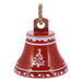Close-up of a red bell with a white Christmas tree design and holly border