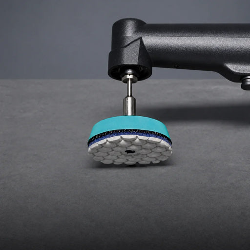 50mm Mini Dry Polishing Pad fitted to a Velcro polishing pad holder on an angle polishing tool