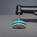 Bihui 50mm Mini Wet Polishing Pad 50 Grit fitted to an angle polisher on a grey tile surface