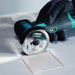 Bihui Mini Cordless Angle Grinder cutting a square opening in a tile