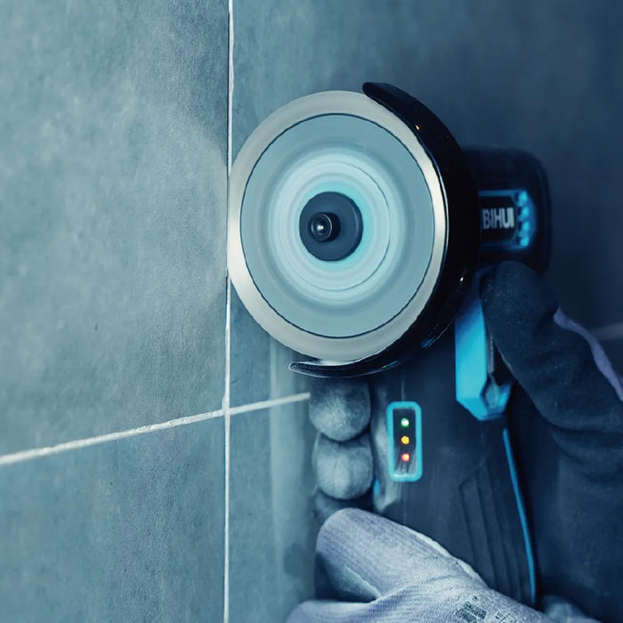 Bihui Mini Design Cutting Blade fitted to a mini angle grinder cutting a wall tile