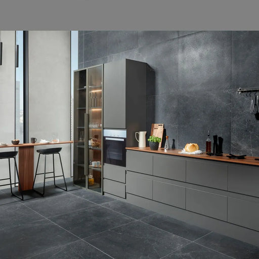 Bleuemix Black Soft Porcelain 90x90 tile in a kitchen floor and wall setting