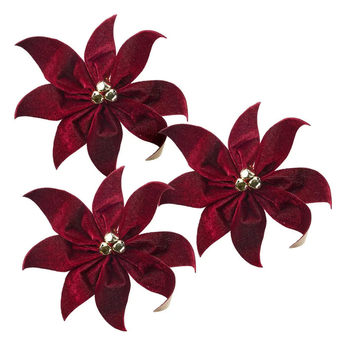 Three burgundy velvet-look poinsettia flowers with gold bell centres