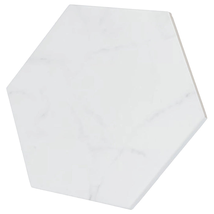 Carrara Hexagon Porcelain 17.5 x 20 Tile in matt marble effect finish, shown at an angle.