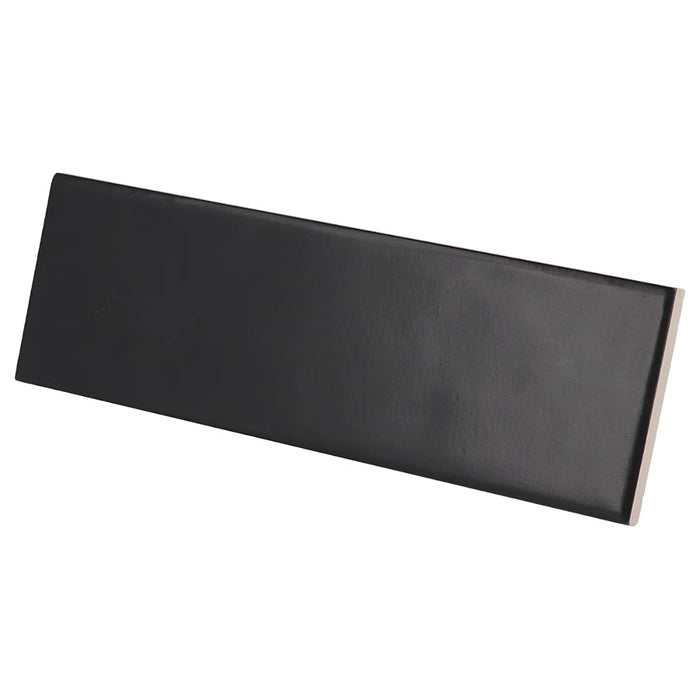 Country Anthracite Matt wall tile in a rich anthracite colour with a slim brick format, shown at an angle.