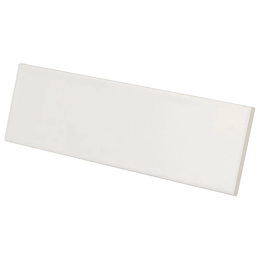 Country Blanco Matt wall tile in a crisp white colour with a slim brick format, shown at an angle.