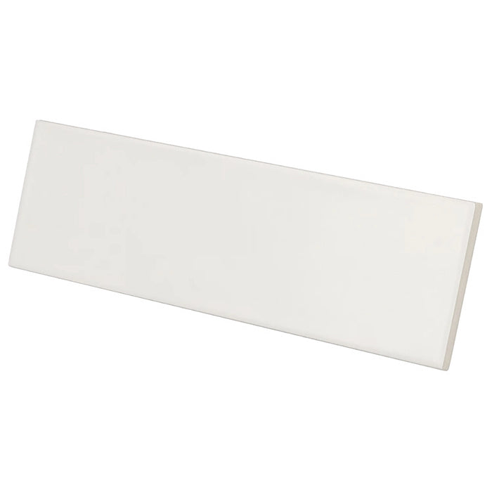 Country Blanco Matt wall tile in a crisp white colour with a slim brick format, shown at an angle.