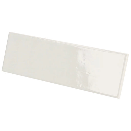 Country Blanco gloss wall tile in a crisp white colour with a slim brick format, shown at an angle.