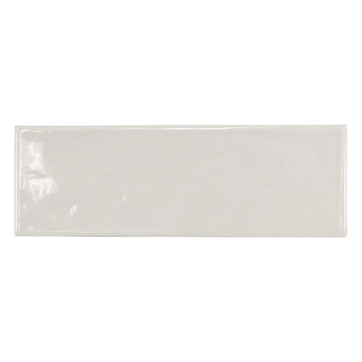 Country Gris Claro gloss wall tile in a soft light grey colour, shown as a single 6.5 × 20 cm white body ceramic tile.