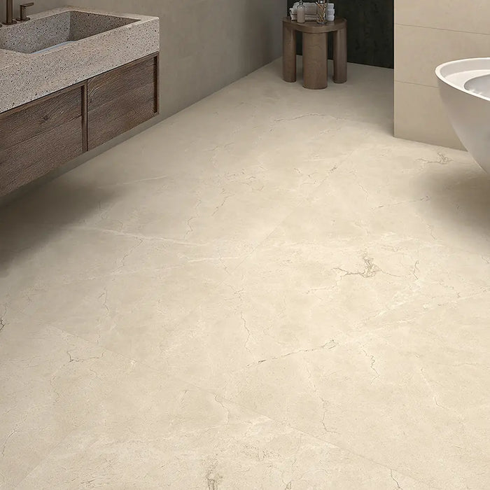 Dakota Cream marble-effect porcelain tile floor in a bathroom setting