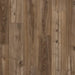 Close-up wood-grain detail of Pergo Drammen Brown Dark Brown leathered oak laminate flooring