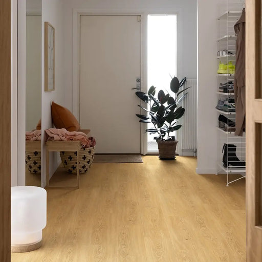 Pergo Drammen Cappuccino laminate flooring in a bright hallway setting