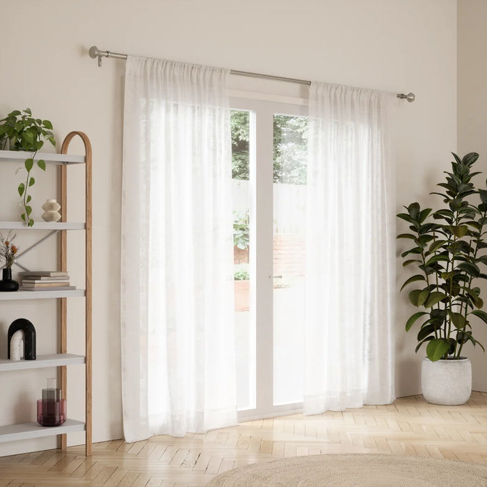 Ella matt nickel curtain pole with sheer curtains in a living room setting