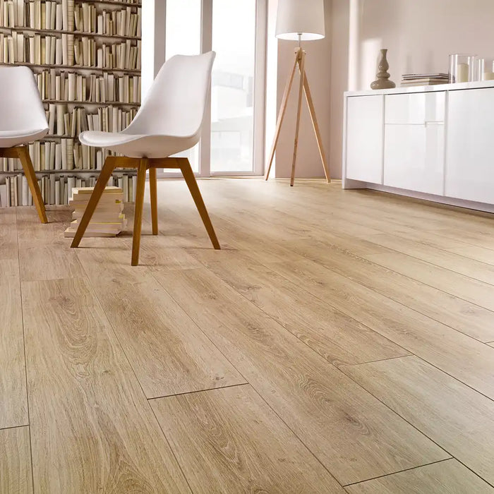 Galway 12mm laminate flooring in a bright, book-lined living space