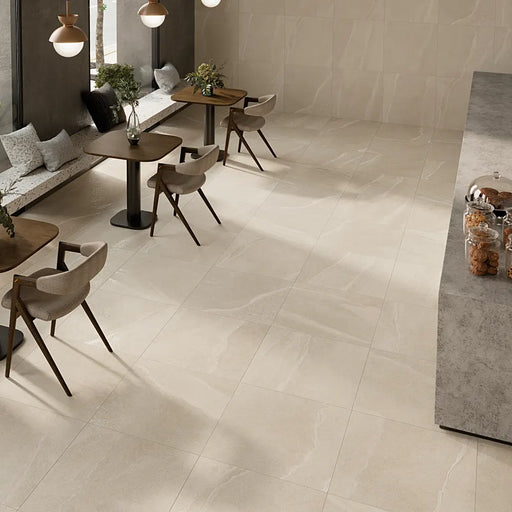 Homeful Essentials Cream Matt 75x75 porcelain floor tiles in a contemporary café interior