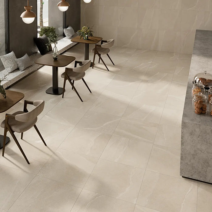 Homeful Essentials Cream Matt 75x75 porcelain floor tiles in a contemporary café interior