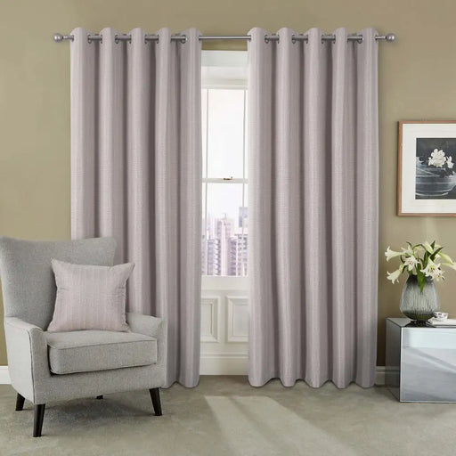 Jacob Taupe eyelet curtains with blackout lining and thermal interlining