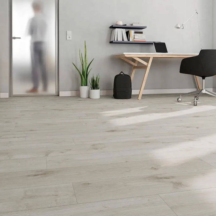 Krono Stone Oak long plank laminate flooring in a home office setting