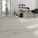 Krono Stone Oak long plank laminate flooring in a home office setting