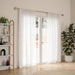 Loop nickel curtain pole with curtain in a living room setting