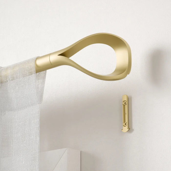 Loop gold curtain pole angled bracket end detail