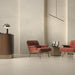 Memory Marfil porcelain tile floor in a reception area setting