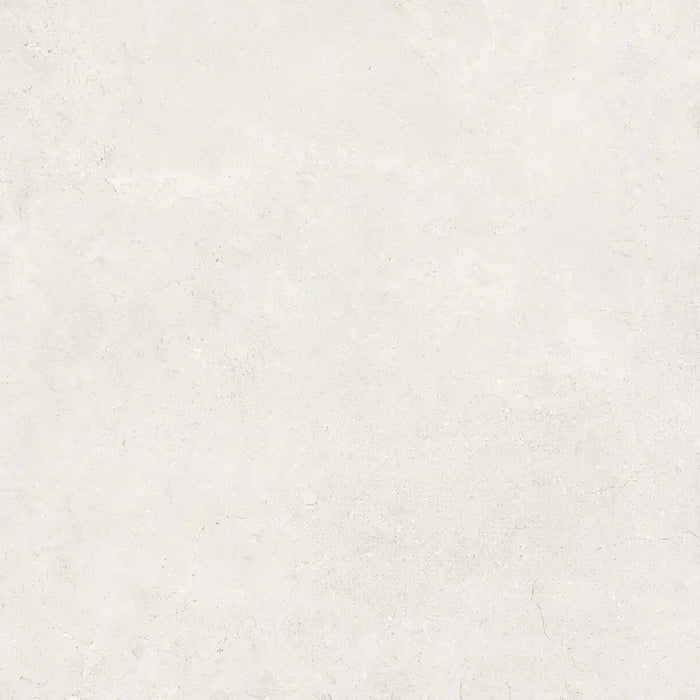 Close-up natural stone texture detail of Montpellier Blanco porcelain tile