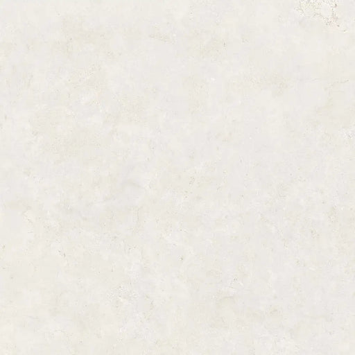 Close-up limestone-effect surface detail of Montpellier Blanco porcelain tile