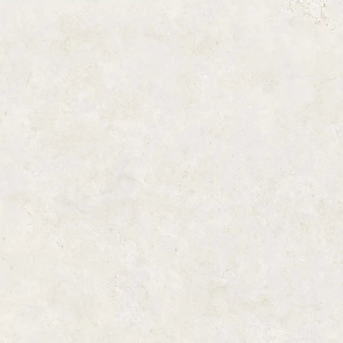Close-up limestone-effect surface detail of Montpellier Blanco porcelain tile