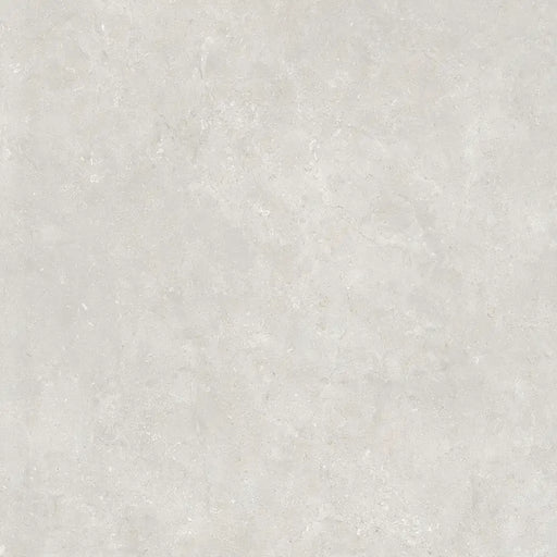 Close-up natural stone texture detail of Montpellier Perla porcelain tile