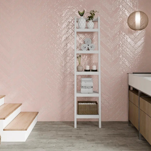 Music Rosa glossy ceramic wall tile laid in a herringbone pattern