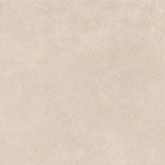 Close-up matt finish surface detail of Portland Marfil porcelain tile