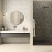 Portland Marfil porcelain tile floor in a bathroom setting