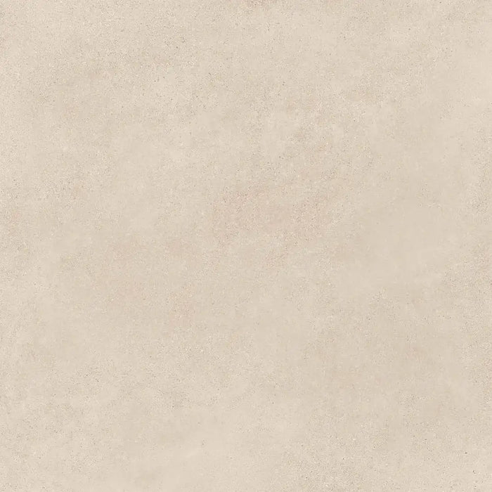 Close-up natural stone-effect surface detail of Portland Marfil porcelain tile