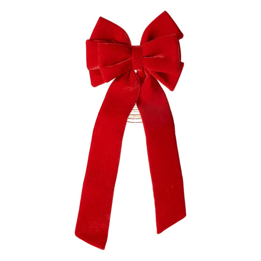 Red velvet-look bow tree topper with long tails and a gold spiral base