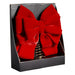 Red bow tree topper presented in a black box