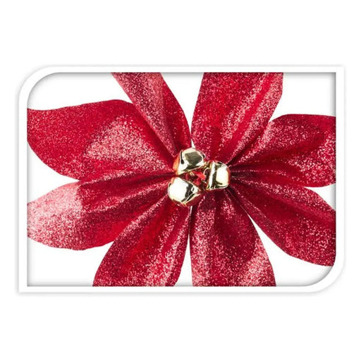 Close-up of a red glitter poinsettia flower with gold bell centre