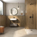 Modern bathroom featuring RLV Viggo Arce 60x120 wood-effect porcelain wall tile with warm oak finish and matt texture