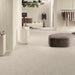 Modern retail interior featuring Rocket Cream Veincut Lappato Porcelain 60x120 tiles on floors and walls